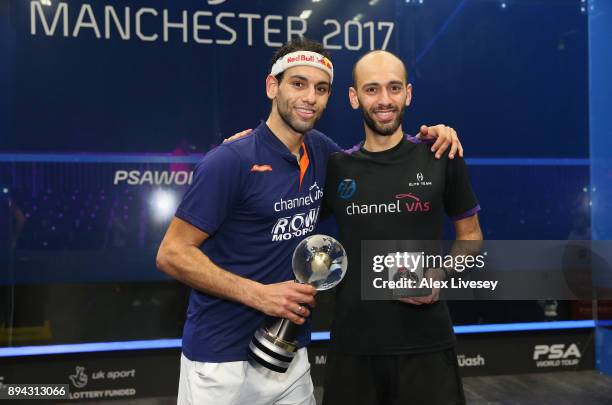 Mohamed ElShorbagy of Egypt poses with his brother Marwan ElShorbagy of Egypt after his victory in the Men's Final of the AJ Bell PSA World Squash...