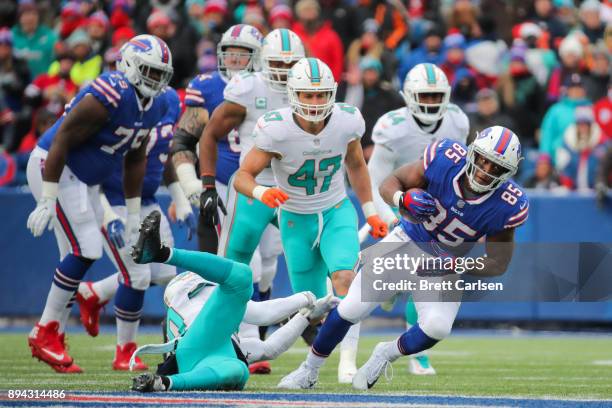 Charles Clay of the Buffalo Bills runs the ball during the second quarter against the Miami Dolphins on December 17, 2017 at New Era Field in Orchard...