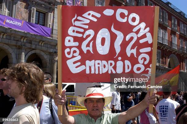 Plaza Mayor. Madrid . Hundreds of people had packed the Plaza Mayor in Madrid from early morning to follow the International Olympic Committee vote...