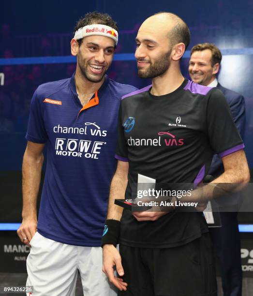 Mohamed ElShorbagy of Egypt talks with his brother Marwan ElShorbagy of Egypt after his victory in the Men's Final of the AJ Bell PSA World Squash...