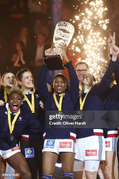 Kalidiatou Niakatem and Siraba Dembele of France celebrate with the trophy after the IHF Women's Handball World Championship final match between...