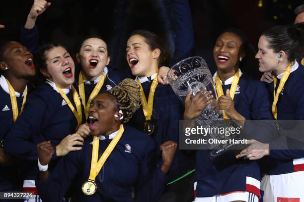 Kalidiatou Niakatem and Siraba Dembele of France celebrate with the trophy after the IHF Women's Handball World Championship final match between...