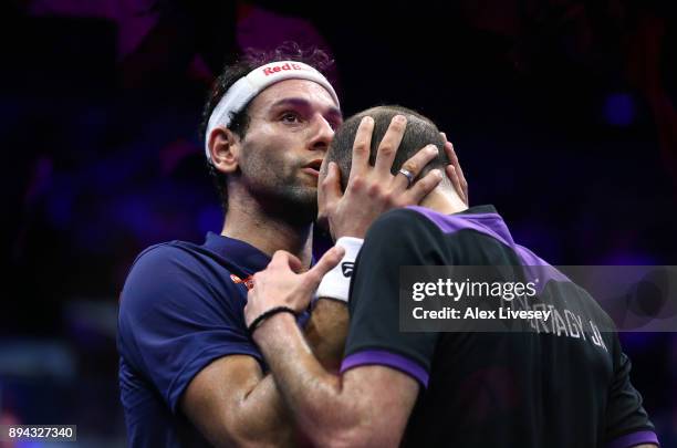 Mohamed ElShorbagy of Egypt embraces his brother Marwan ElShorbagy of Egypt after his victory in the Men's Final of the AJ Bell PSA World Squash...