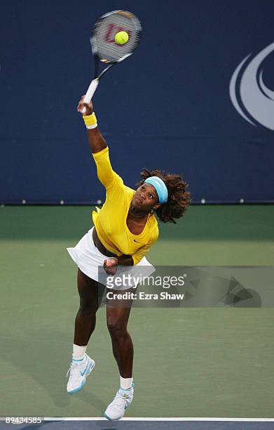Serena Williams serves to Na Li of China during their match at the Bank of the West Classic Day Two at Stanford University on July 28, 2009 in...