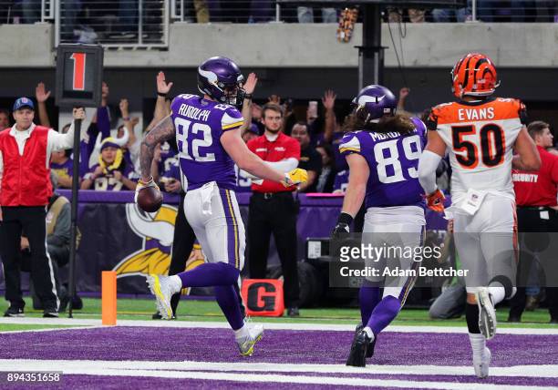 Kyle Rudolph of the Minnesota Vikings celebrates after scoring a touchdown in the third quarter of the game against the Cincinnati Bengals on...
