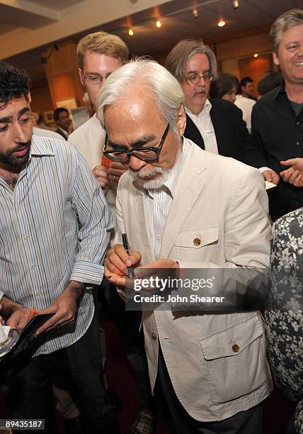 Japanese film maker Hayao Miyazaki signs autographs at AMPAS' 14th annual Marc Davis Celebration of Animation at the AMPAS Samuel Goldwyn Theater on...