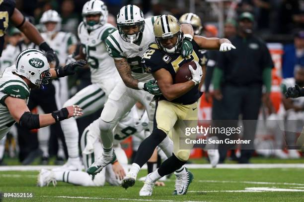 Outside linebacker Craig Robertson of the New Orleans Saints returns an interception during the second half of a game against the New York Jets at...
