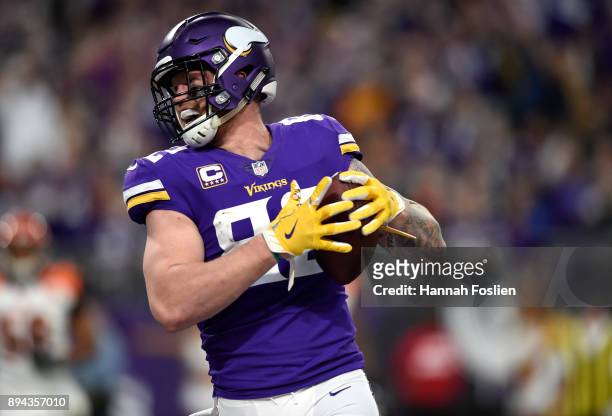 Kyle Rudolph of the Minnesota Vikings celebrates after catching the ball for a touchdown in the third quarter of the game against the Cincinnati...