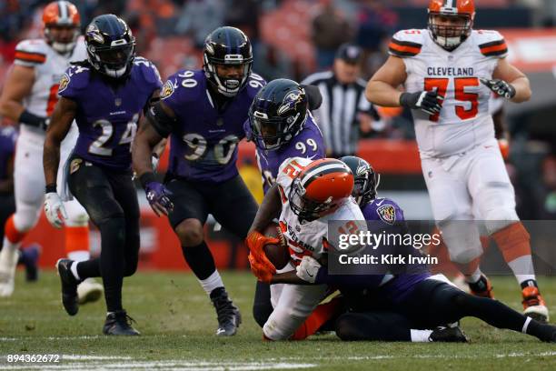 Eric Weddle of the Baltimore Ravens tackles Josh Gordon of the Cleveland Browns in the second half at FirstEnergy Stadium on December 17, 2017 in...