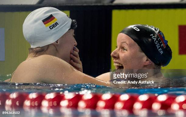 Sarah Koehler of Germany and Julia Hassler of Lithuania celebrate together after the Women's 400m Final during the European Short Course Swimming...