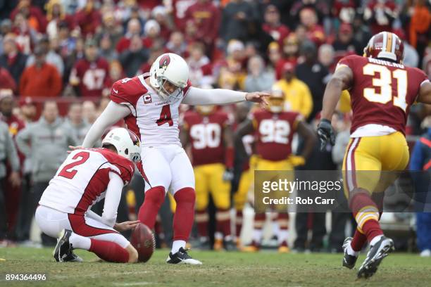 Phil Dawson of the Arizona Cardinals kicks a field goal in the fourth quarter against the Washington Redskins at FedEx Field on December 17, 2017 in...