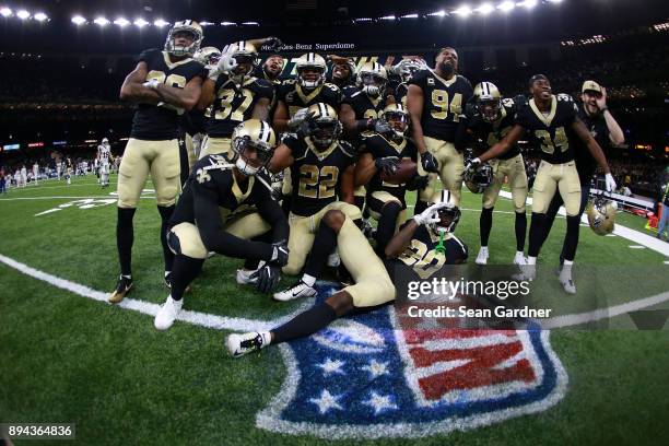 The New Orleans Saints celebrate after a game against the New York Jets at the Mercedes-Benz Superdome on December 17, 2017 in New Orleans, Louisiana.