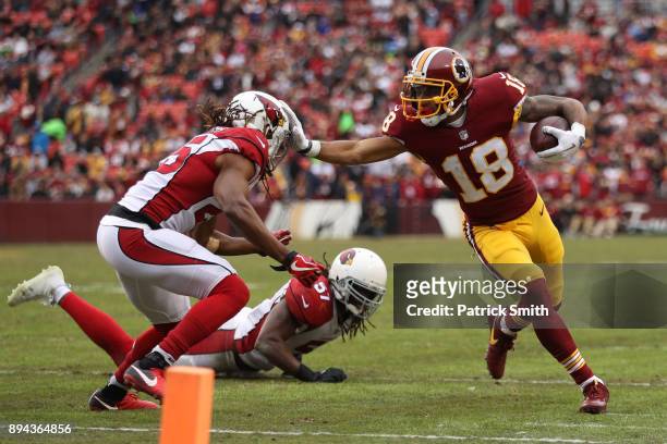 Wide Receiver Josh Doctson of the Washington Redskins runs with the ball in the fourth quarter against the Arizona Cardinals at FedEx Field on...