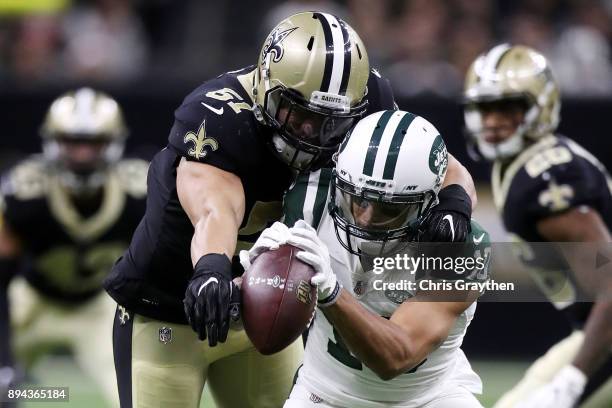 Manti Te'o of the New Orleans Saints breaks up a pass against Jermaine Kearse of the New York Jets at Mercedes-Benz Superdome on December 17, 2017 in...
