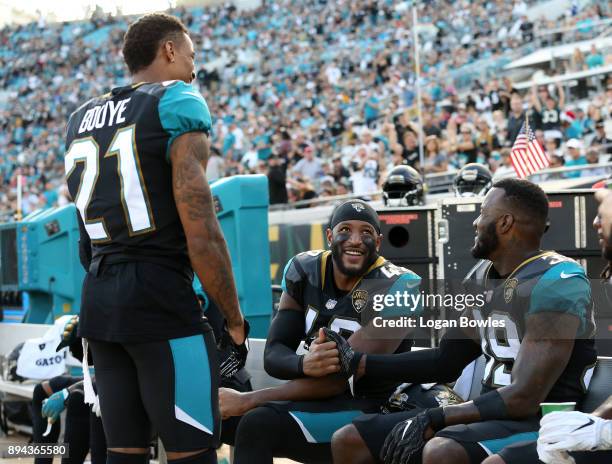 Bouye, Barry Church and Tashaun Gipson of the Jacksonville Jaguars celebrate on the bench late in the second half of their game against the Houston...