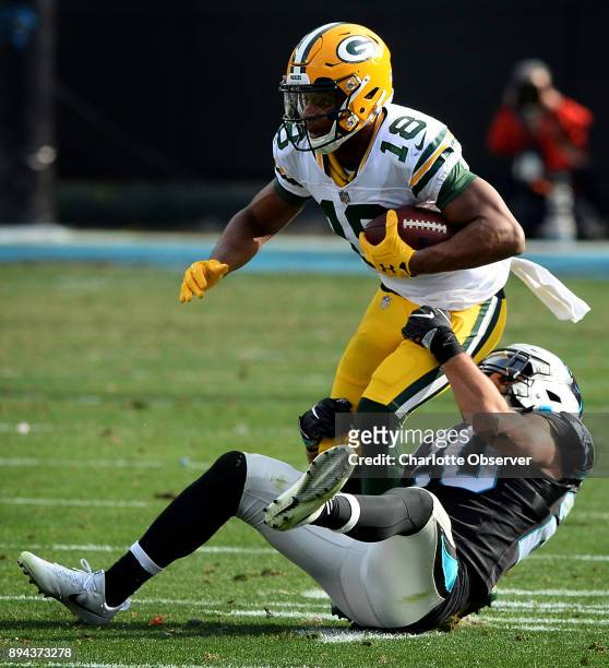 Carolina Panthers safety Kurt Coleman tackles Green Bay Packers wide receiver Randall Cobb during second quarter action on Sunday, Dec. 17, 2017 at...
