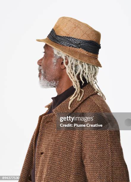 portrait of mature man on white background - dreadlocks stock pictures, royalty-free photos & images