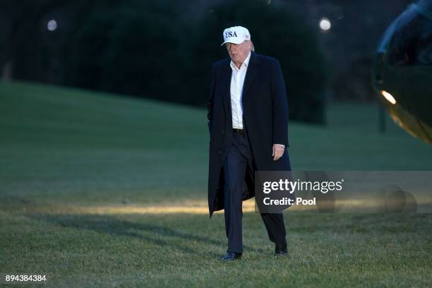 President Donald Trump arrives back at the White House on December 17, 2017 in Washington, DC. Trump is returning after an overnight stay at Camp...