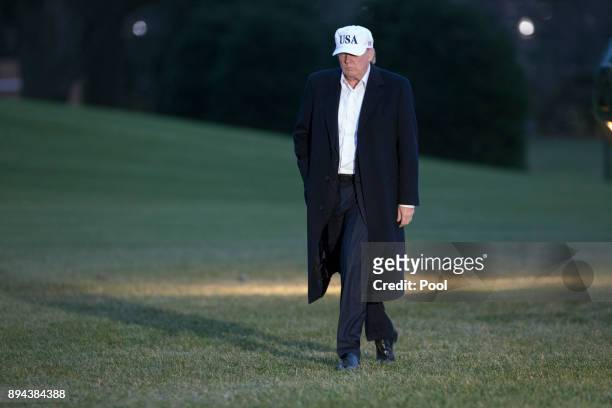 President Donald Trump arrives back at the White House on December 17, 2017 in Washington, DC. Trump is returning after an overnight stay at Camp...