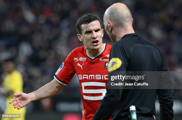 Romain Danze of Stade Rennais argues with referee Antony Gautier during the French Ligue 1 match between Stade Rennais and Paris Saint Germain at...