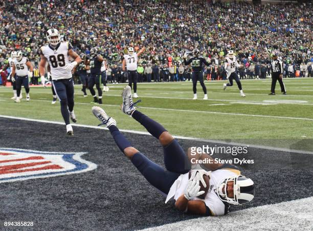 Wide receiver Robert Woods of the Los Angeles Rams makes a 1 yard touchdown against the Seattle Seahawks during the 2nd quarter of the game at...