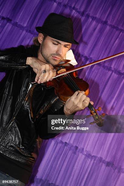 German violinist David Garrett performs for the press during a press conference in order to promote his new album 'Encore' and his upcoming tour in...
