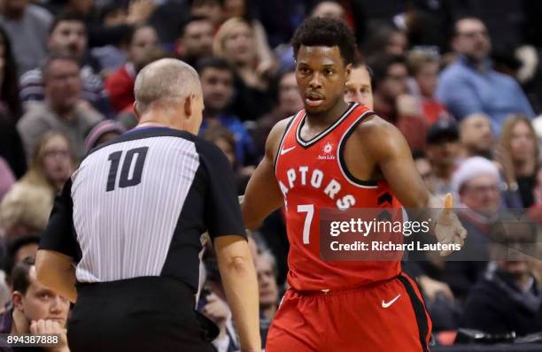 In second half action, referee Ron Garretson has a chat with Toronto Raptors guard Kyle Lowry The Toronto Raptors beat the Sacramento Kings 108-93 at...