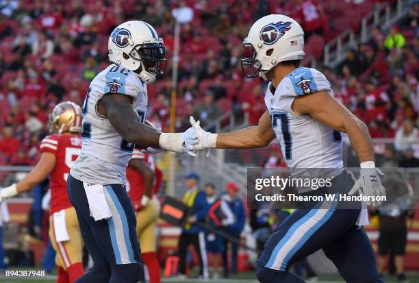 Delanie Walker and Eric Decker of the Tennessee Titans celebrate after Walker caught a touchdown pass against the San Francisco 49ers during their...