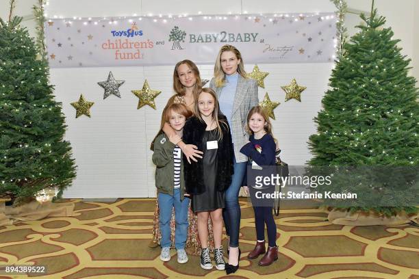 Jennifer Meyer, Sara Foster and children attend The Baby2Baby Holiday Party presented by Toys"R"Us at Montage Beverly Hills at Montage Beverly Hills...