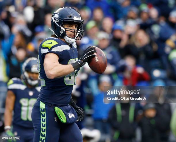 Tight end Luke Willson of the Seattle Seahawks reacts after scoring a touchdown against the Los Angeles Rams during the third quarter of the game at...