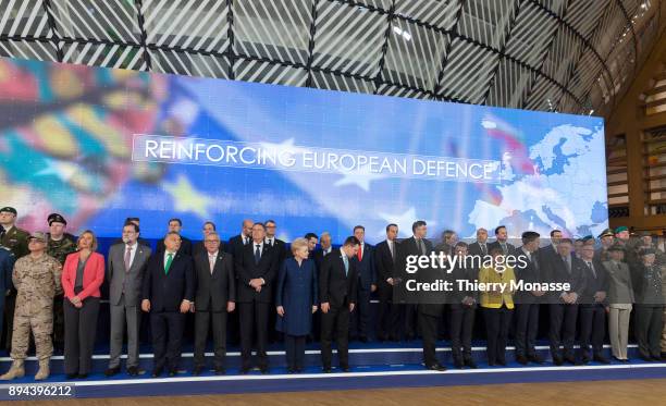 Leaders pose for a ceremony on the Permanent Structure Cooperation on the margin of an European Council in the Europa, the EU Council headquarter, on...