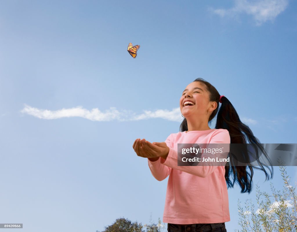 Hispanic Girl and Butterfly