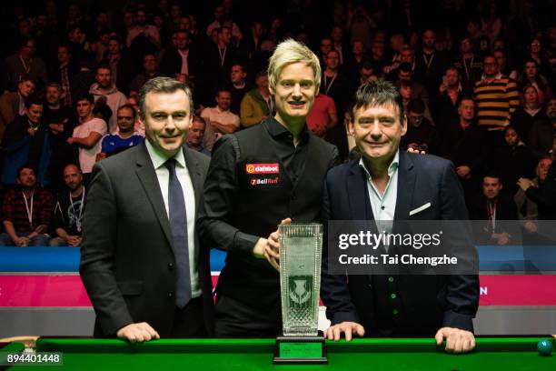 Neil Robertson of Australia poses with his trophy after winning the final match against Cao Yupeng of China on day seven of the 2017 Scottish Open at...