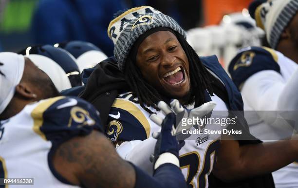 Running back Todd Gurley of the Los Angeles Rams laughs on the sidelines during the fourth quarter of the game against the Seattle Seahawks at...
