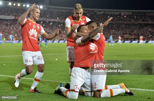 Wilson Morelo of Santa Fe celebrates with teammates after scoring the first goal of his team during the second leg match between Millonarios and...
