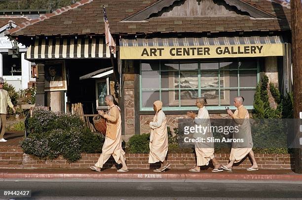 Hare Krishna procession passes the Art Center Gallery in Laguna Beach, California, January 1970.