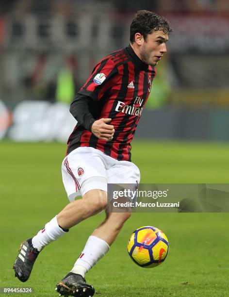 Davide Calabria of AC Milan in action during the Tim Cup match between AC Milan and Hellas Verona FC at Stadio Giuseppe Meazza on December 13, 2017...