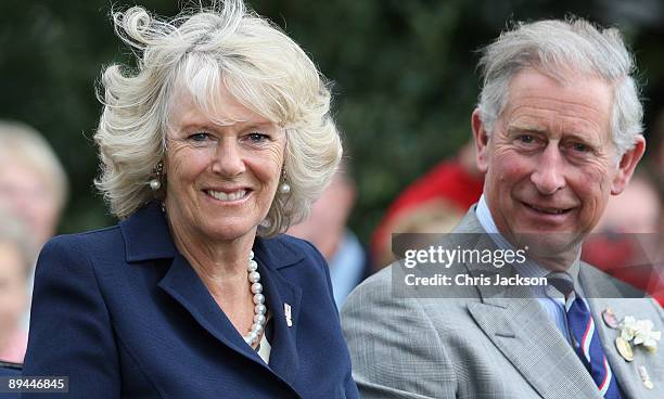 Camilla, Duchess of Cornwall and Prince Charles, Prince of Wales leave Sandringham Flower Show in a horse drawn carriage on July 29, 2009 in Kings...