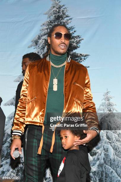 Rapper Future with his son Future Zahir Wilburn onstage at 5th Annual FreeWishes Foundation A Winter Wishland at Bessie Branham Park on December 17,...