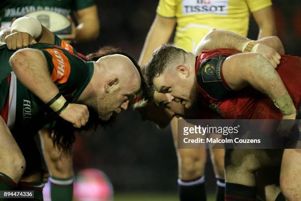 Dan Cole of Leicester Tigers scrums-down with Stephen Archer of Munster during the European Rugby Champions Cup match between Leicester Tigers and...