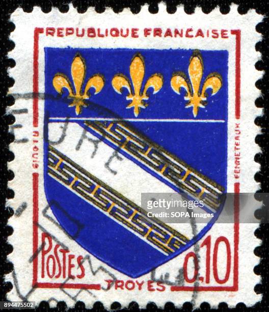 Stamp printed in France shows coat of arms of Troyes, the capital of the Aube department in north-central France , circa 1963.