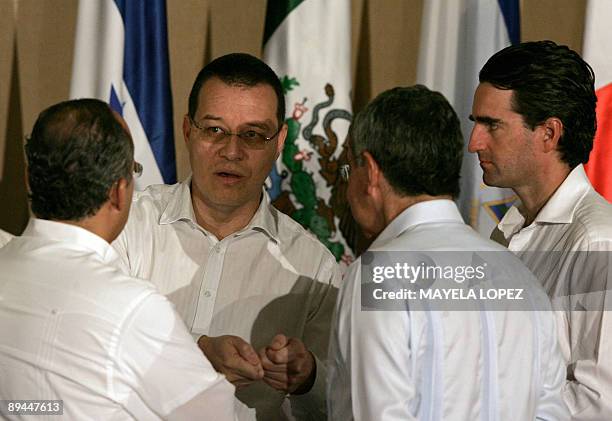 Aristides Mejia , representative of ousted Honduran President Manuel Zelaya, talks with Mexican President Felipe Calderon , Costa Rican President...