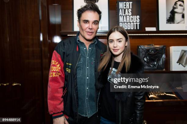 Photographer David LaChapelle and actress Lily Collins attend the David LaChapelle book signing at TASCHEN Store Beverly Hills on December 17, 2017...