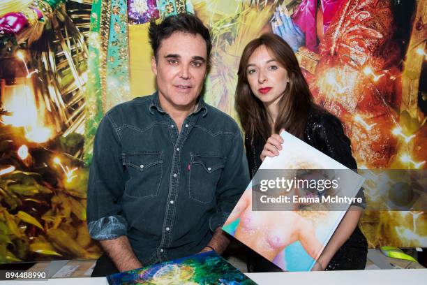 Photographer David LaChapelle and Charlotte Taschen attend the David LaChapelle book signing at TASCHEN Store Beverly Hills on December 17, 2017 in...