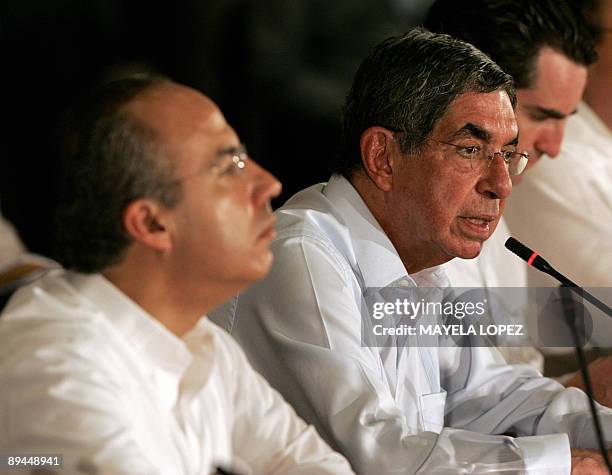Costa Rican President Oscar Arias inaugurates next to his Mexican counterpart Felipe Calderon the XI Presidential Summit of Mechanisms of Dialogue...