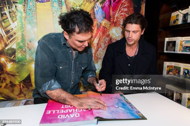 Photographer David LaChapelle and actor Will Brandt attend the David LaChapelle book signing at TASCHEN Store Beverly Hills on December 17, 2017 in...