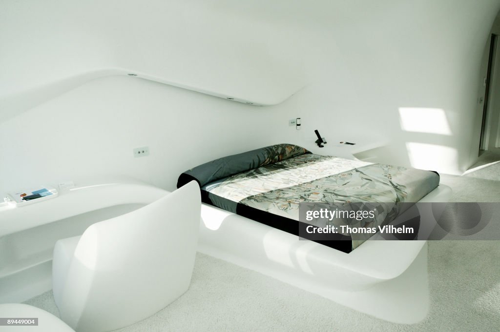 Madrid. Hotel Puerta America. The hotel offers 342 rooms and suites, set out over twelve floors. Twelve floors means twelve designers and architects, including heavyweights Sir Norman Foster, Zaha Hadid and Jean Nouvel.