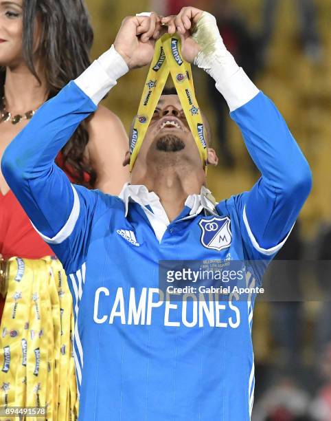 Ayron del Valle of Millonarios lifts his medal to celebrate after winning the second leg match between Millonarios and Santa Fe as part of the Liga...