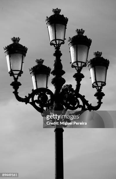 Madrid buildings. Details of a classic lamppost, in the Madrid de los Austrias.