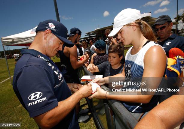 Brendon Bolton, Senior Coach of the Blues signs autographs during the Carlton Blues AFL pre-season training session at Maroochydore Multisport...